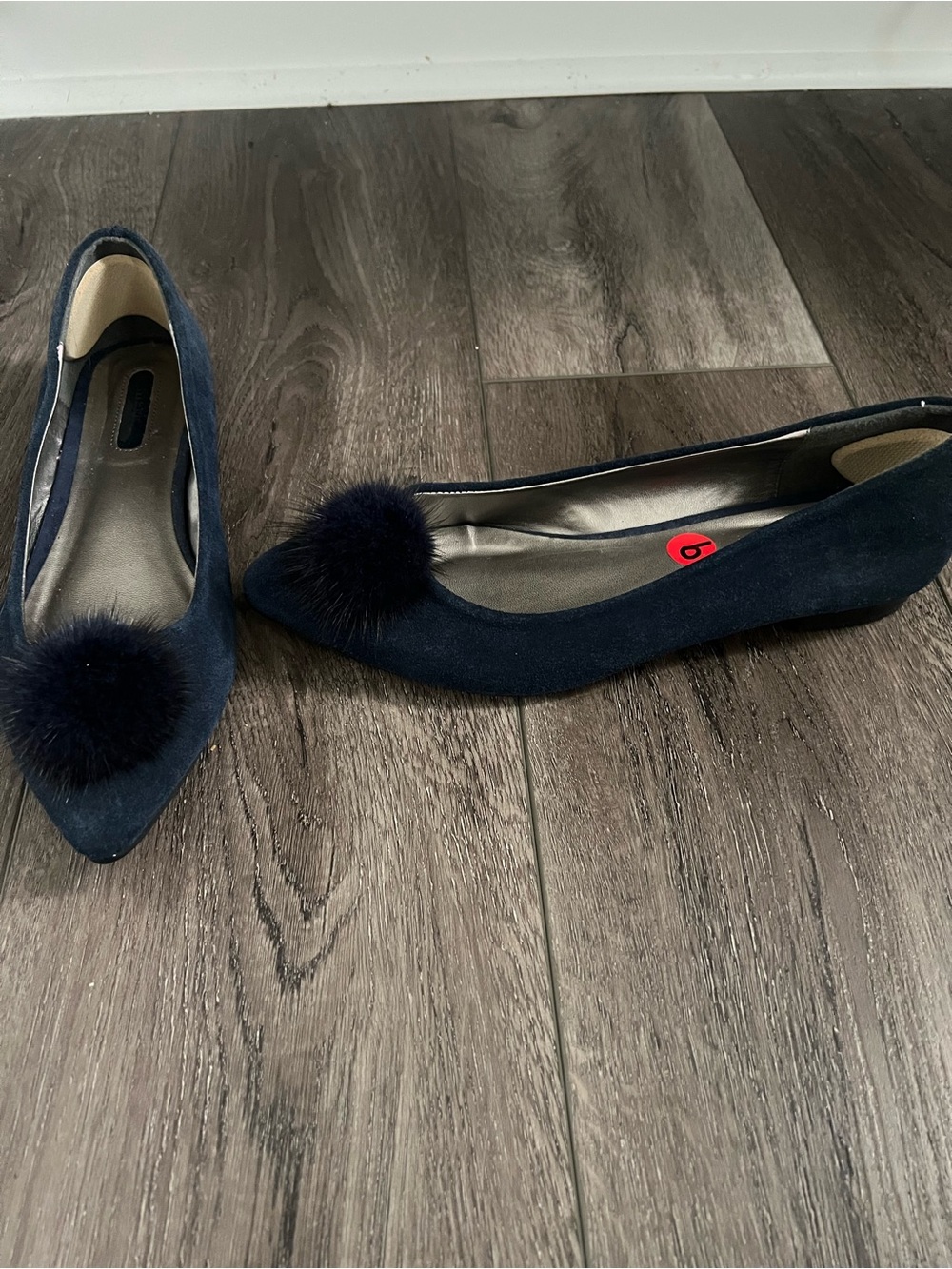 mark. Navy Pointed-Toe Pom-Pom Flats